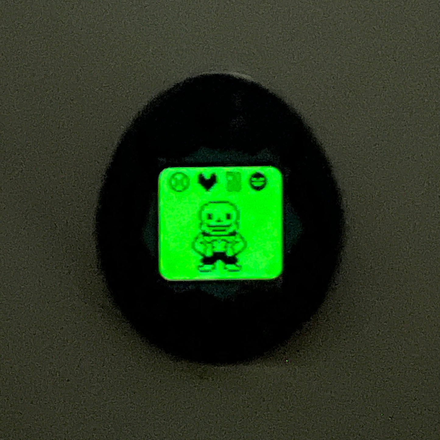 sansagotchi enamel pin (glows in the dark!!)